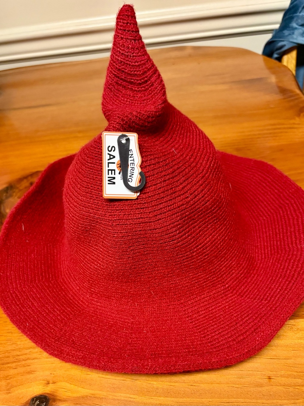Red Pointed Witch Hat with 'Entering Salem' Tag -